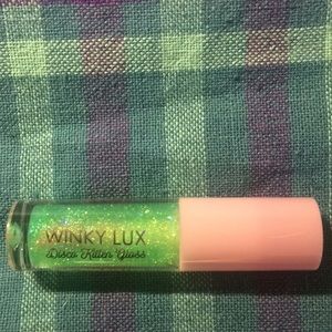 Winky Lux glitter in Groovy. Lip and body.